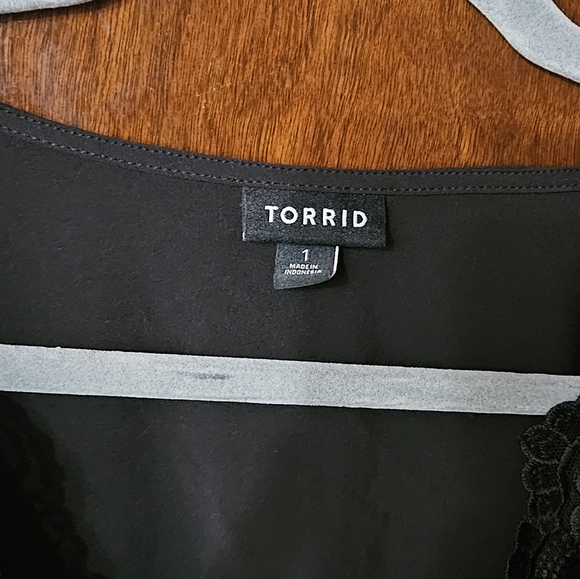 NWOT Torrid Black Surplice Peplum Top with Lace - Picture 2 of 5